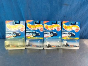 Four packaged 1994 Hot Wheels Dragster #278 from the Race Team Series.