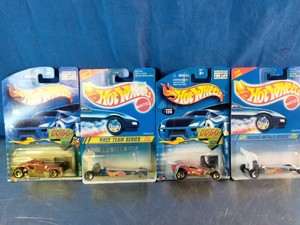 Four packaged vintage Hot Wheels diecast cars