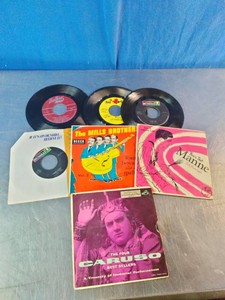 A collection of vintage 7-inch 45 RPM vinyl records