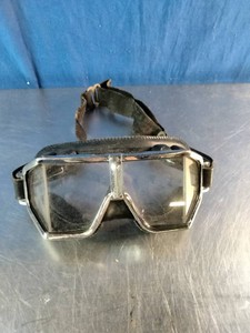 Vintage metal-framed goggles with clear split lenses