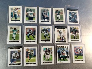 A collection of encased Philadelphia Eagles football trading cards featuring various players