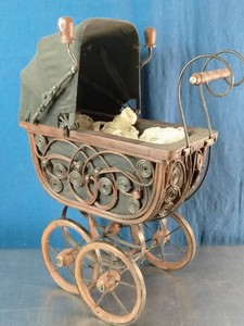 Antique vintage Victorian-style baby doll pram (or doll buggy).