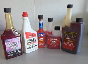 5- Sealed Bottles (5-in-1, Gas Fuel System Cleaner, STP Gas Treatment, STA-BIL Storage, STA-BIL Fuel Stabilizer)- Worked great for storing the lawnmover for the winter