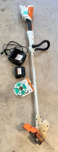 G - Stihl Cordless String Trimmer Lot with Battery, Charger & Line