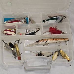 Tackle Box Full of Spoons, Plugs, and Daredevils