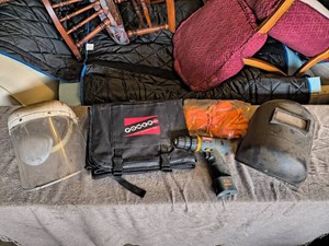 Welding Helmets, Ryobi Cordless Drill, New in package Gloves, Handyman Blanket- Lot of 5