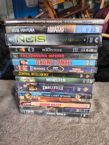 DVDS- Jurassic World, XMEN, Smallville, NCIS, Doctor Strange, Ronnie Milsap, Central Intelligence, Glory Daze, Monster, Hercules(animated), Lot of 15
