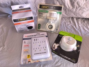 Monster Power Home Surge Protection, Home Security Camera, Spotlight for Security Camers, and Photo Control Light for security camera- Lot of 4
