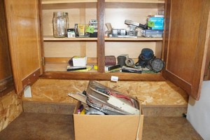 Contents of Cabinet - Fasteners, Palm Sander
