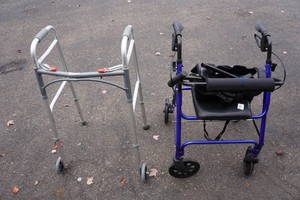 2 Walkers - One with Seat and Brakes - Plus Knee Braces and Cane