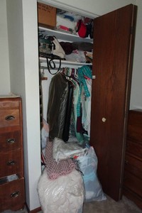 Contents of Closet - Clothes, Bedding, Fan