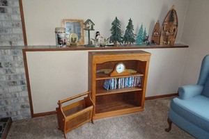Bookshelf with Assorted Dcor and DVDs