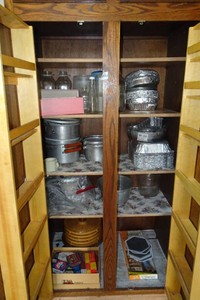 Contents of Cabinet - Aluminum Pans, Pots, Glass Bottles