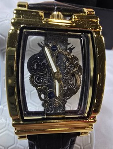 Gold-Tone Skeleton Mechanical Watch  Exhibition Case  Black Strap  Box