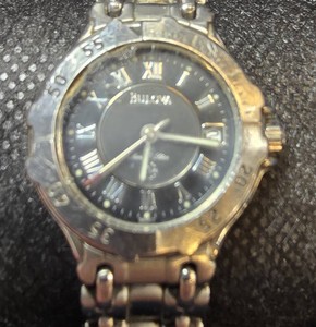 Bulova Marine Star Two-Tone Watch  Black Roman Numeral Dial  Date  100M Water Resistant