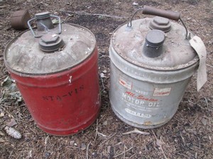 Pair of Vintage Montgomery Ward Motor oil cans