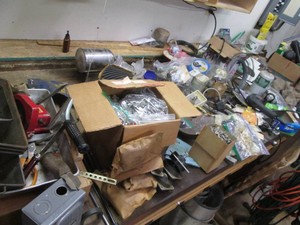 High value of supplies with the content on workbench to include a vast array of construction hardware, wire, fasteners, small appliance style motors, micro switches, and so much more