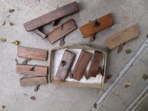 Variety of vintage wood hand planers