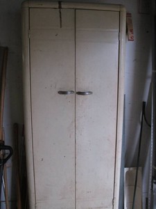 Vintage metal pantry cabinet with content approx 25x12x64in