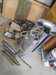 High value lot containing plumbing supplies, ducting, grease guns and more