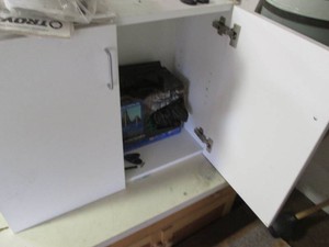 Laminate wall mounting cupboard approx 30x13x24in plus content