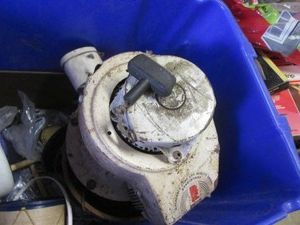 Large recycling tote with vintage engine and other misc shown