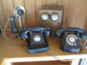 Antique Candlestick style telephone, switchboard style phone and rotary phobe