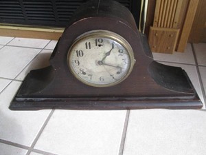 Vintage camelback style mantle clock