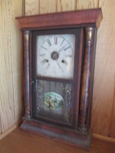 Vintage Wood Encased Mantle Clock with roman numerals, lower glass tablet with design