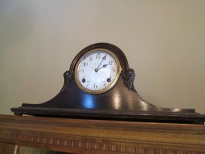 Vintage camelback style mantle clock