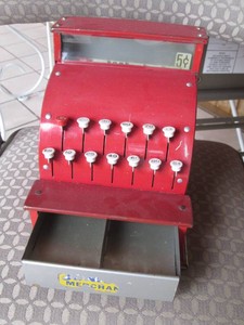 Metal child size merchant cash register, bell dings when drawer opens