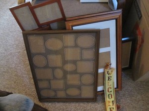 Collection of collage style picture frame decor