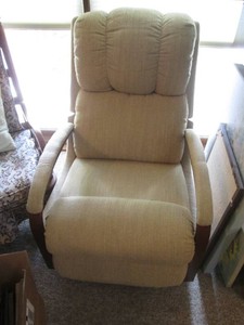 Vintage upholstered Rocking recliner