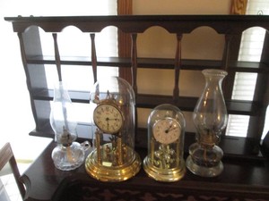 Vintage Glass Dome anniversary clocks with Vintage oil lamps