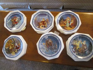 Collection of decorative Santas on His Way display plates