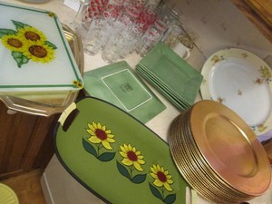Collection of vintage highball glasses, margarita glasses, butter dish, Square glass plates, cutting board and assorted serving platestrays