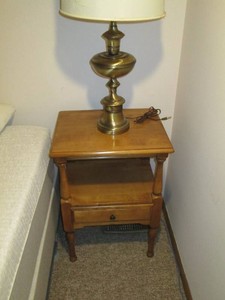 Pair of uniquely designed wood side tables with drawer and open storage plus brass tone table lamp with shade