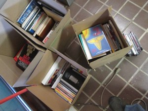 Collection of Reading materials from a variety of topics including Nazi Germany , road atlases, DVD movies and more