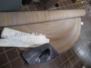Large oval braided rug and 2 runner rugs