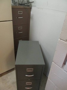1 Four drawer and 2 Two drawer metal file cabinets