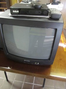 Small TV with remote and RCA antennae box