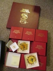 Boxed set of Hummel gold Christmas ornaments