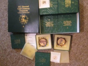 Boxed set of Hummel gold Christmas ornaments