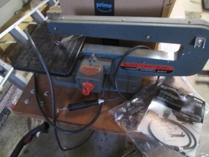 Craftsman scroll saw with flexible rotary shaft and accessories