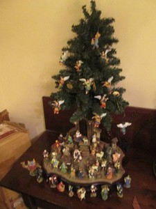 Intricate Christmas gathering with Tree scene decor