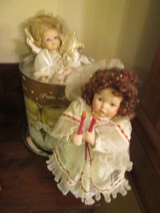 Pair of Christmas themed Porcelain dolls