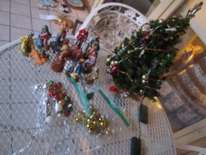 Miniature artificial Christmas tree with miniature ornaments plus vintage plastic Nativity scene participants