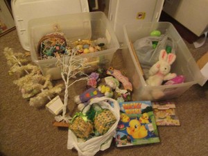 (2) Lidded totes containing a variety of seasonal Easter decor including artificial trees with miniature ornaments, faux egg wreath and more