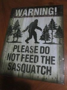 Sasquatch metal sign measures 12 x 14 inches