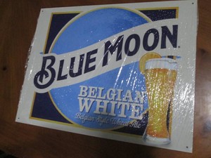 Blue Moon metal sign measures 12 x 14 inches